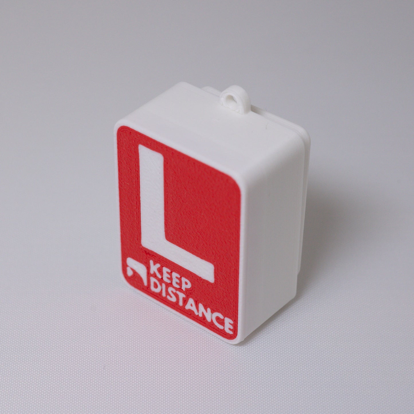 L-Sign Clicker Keychain