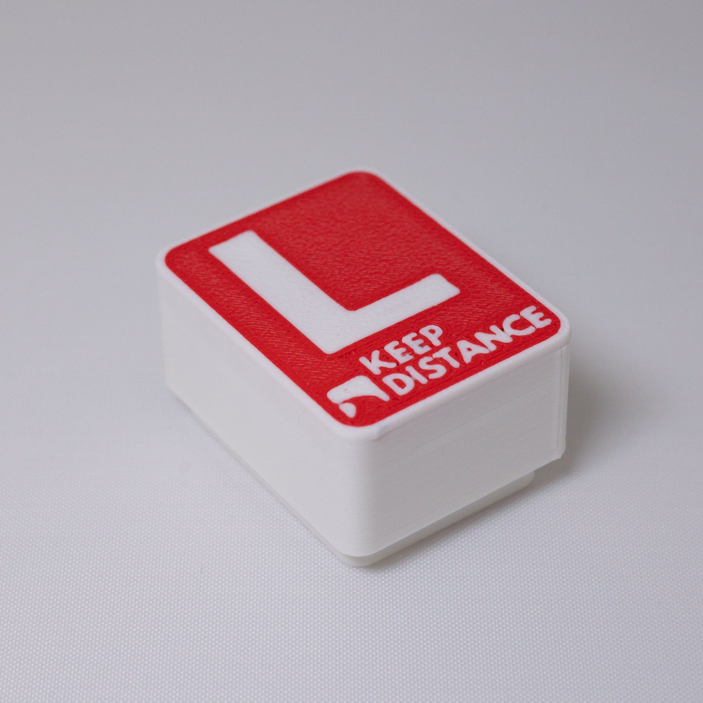 L-Sign Clicker Keychain